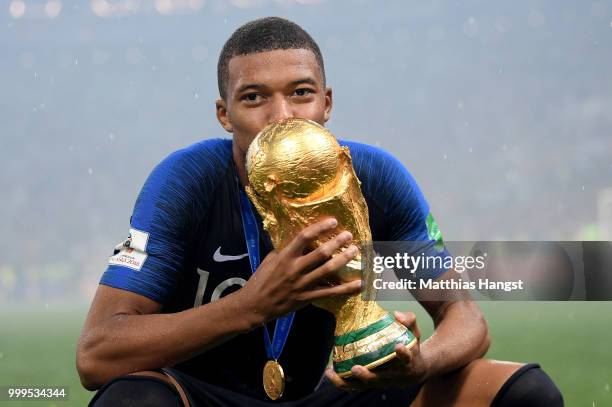 Kylian Mbappe of France celebrates with the World Cup Trophy following his sides victory in the 2018 FIFA World Cup Final between France and Croatia...