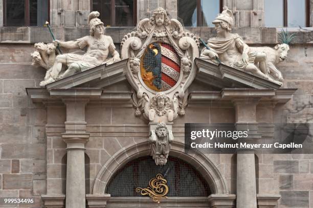 right portal of the west facade with imperial coat of arms and the many-headed, winged leopard and the beast with ten horns of daniel chapter 7, town hall, renaissance 1616-1622, nuremberg, middle franconia, bavaria, germany - chapter stock-fotos und bilder