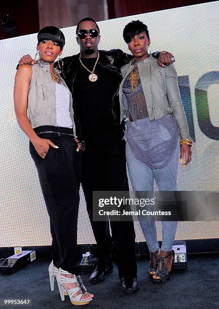 Rapper and music mogul Sean "Diddy" Combs and singers Dawn Richard and Kaleena pose for a photo after they announce the host, nominees and performers...
