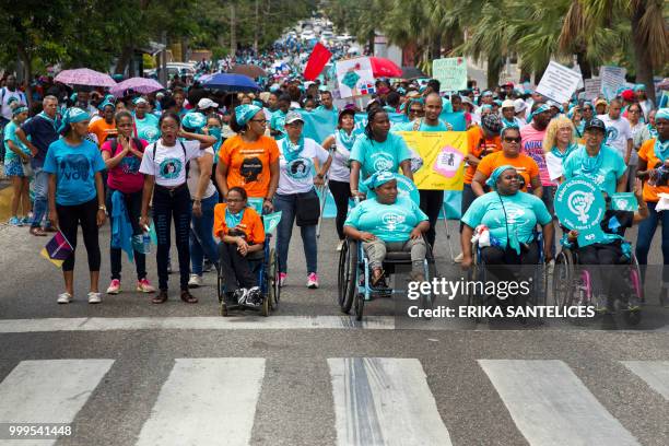 People take part in a march for the decriminalization of abortion in three circumstances -when the life of the pregnant woman is in danger, when the...