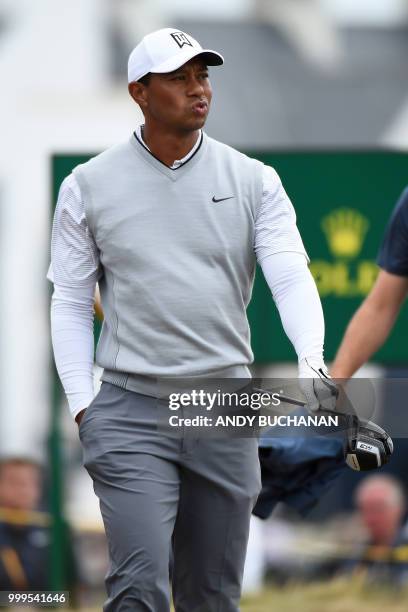 Golfer Tiger Woods walks down the 2nd fairway during the first practice session at The 147th Open Championship at Carnoustie, Scotland on July 15,...