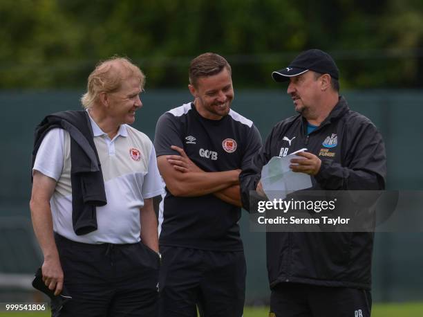 St.Patricks Head Coach Liam Buckley and Coach Ger O'Brien meet Newcastle United Manager Rafael Benitez during the Newcastle United Training session...
