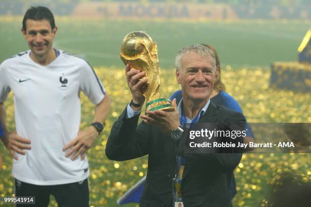 Didier Deschamps head coach / manager of France celebrates with the FIFA World Cup trophy he has now won the World Cup as both a player and manager...