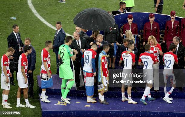 Players from Croatia are presented with their runner up medals following the 2018 FIFA World Cup Final between France and Croatia at Luzhniki Stadium...