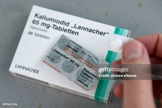 Blister of iodine tablets can be seen in the hands of a member of the Vitr family in Aachen, Germany, 28 August 2017. From the 1st of September...