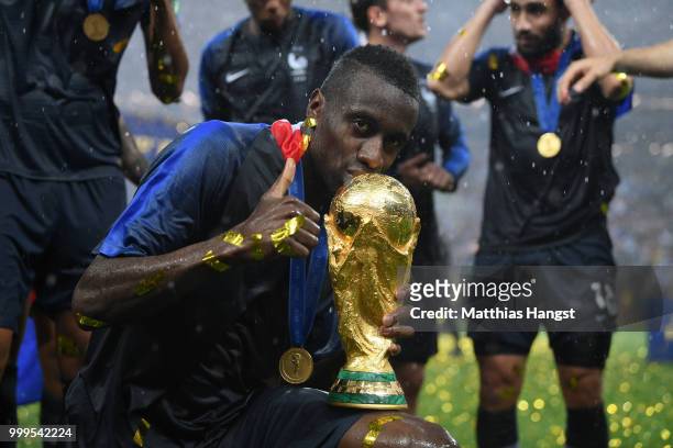 Blaise Matuidi of France celebrates with the World Cup Trophy following his sides victory in the 2018 FIFA World Cup Final between France and Croatia...