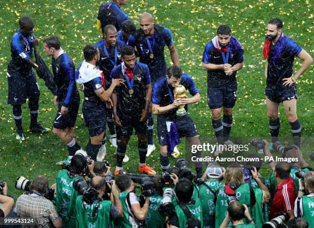 France's Benjamin Pavard celebrates with the trophy after winning the FIFA World Cup Final at the Luzhniki Stadium, Moscow.