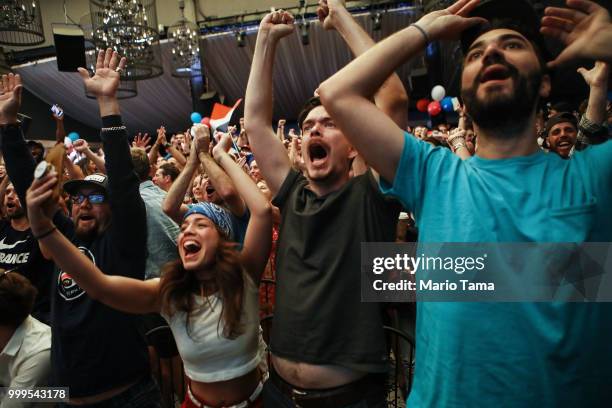 France fans celebrate at a French watch party at Liasion restaurant in Hollywood after France scored to put the team up 1-0 against Croatia in the...