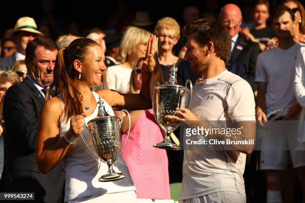 Alexander Peya of Austria and Nicole Melichar of The United States celebrate with their trophies after the Mixed Doubles final against Jamie Murray...
