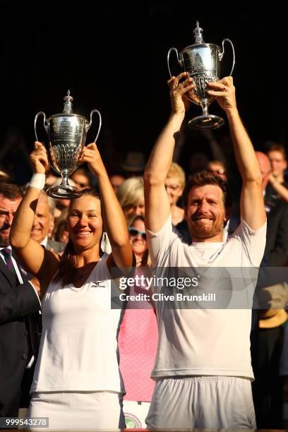 Alexander Peya of Austria and Nicole Melichar of The United States celebrate with their trophies after the Mixed Doubles final against Jamie Murray...