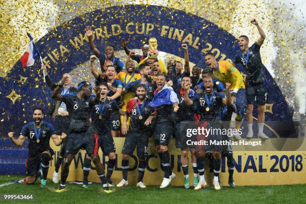 Hugo Lloris of France lifts the World Cup trophy to celebrate with his teammates after the 2018 FIFA World Cup Final between France and Croatia at...