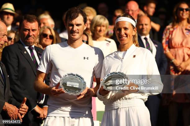 Jamie Murray of Great Britain and Victoria Azarenka of Belarus pose with their trophies after losing the Mixed Doubles final against Alexander Peya...