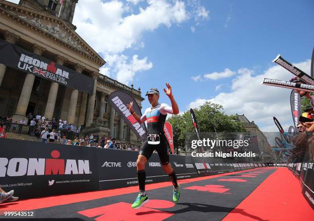 An athlete finishes Ironman UK on July 15, 2018 in Bolton, England.