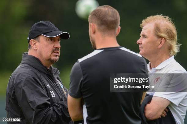 St.Patricks Head Coach Liam Buckley and Coach Ger O'Brien meet Newcastle United Manager Rafael Benitez during the Newcastle United Training session...