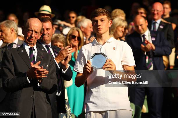 Jack Draper of Great runner-up in the Boys' Singles final, poses with his trophy at Centre Court on day thirteen of the Wimbledon Lawn Tennis...