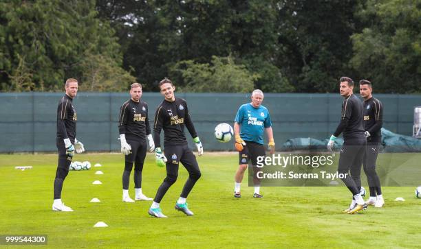 Goalkeepers Matz Sels, Rob Elliot, Freddie Woodman, Martin Dubravka and Karl Darlow warm up with Goalkeeping Coach Simon Smith during the Newcastle...