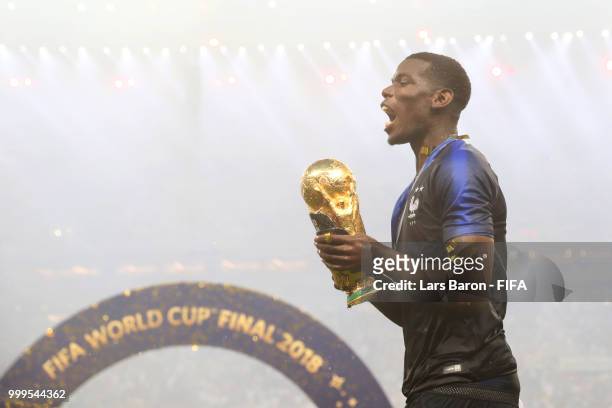 Paul Pogba of France lifts the World Cup trophy following the 2018 FIFA World Cup Final between France and Croatia at Luzhniki Stadium on July 15,...