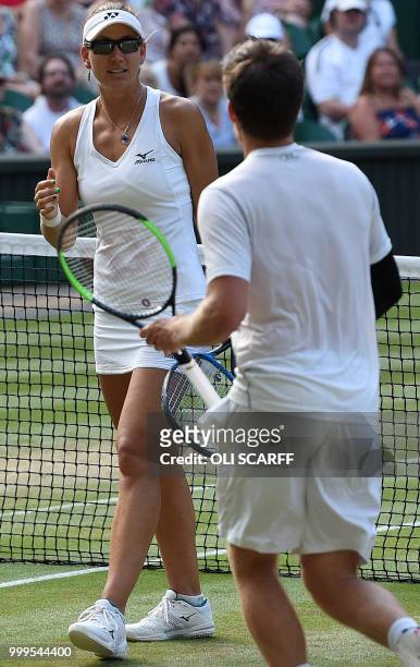 Austria's Alexander Peya and US player Nicole Melichar play against Britain's Jamie Murray and Belarus's Victoria Azarenka during their mixed doubles...