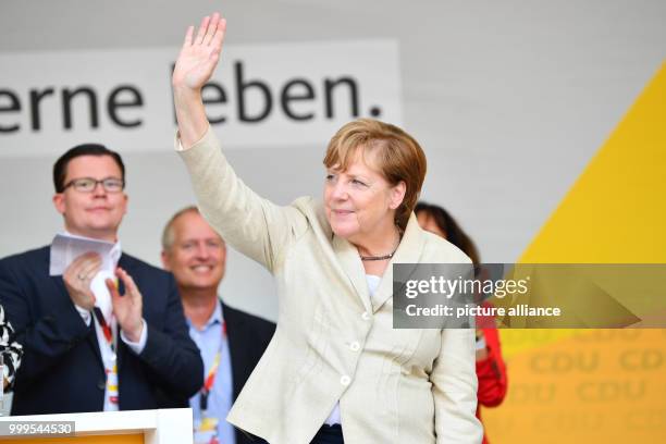 German Chancellor Angela Merkel waving during an electoral campaign event at the Theaterplatz in Ludwigshafen, Germany, 30 August 2017. Photo: Uwe...