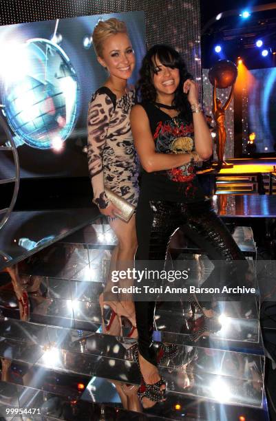 Hayden Panetierre and Michelle Rodriguez pose on stage during the World Music Awards 2010 at the Sporting Club on May 18, 2010 in Monte Carlo, Monaco.