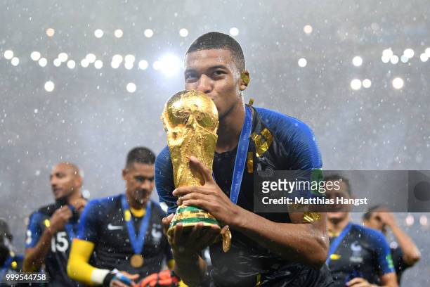 Kylian Mbappe of France celebrates with the World Cup trophy following the 2018 FIFA World Cup Final between France and Croatia at Luzhniki Stadium...