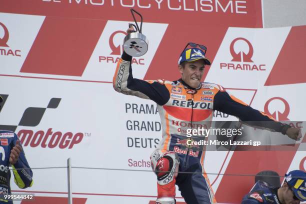 Marc Marquez of Spain and Repsol Honda Team celebrates the victory on the podium at the end of the MotoGP race during the MotoGp of Germany - Race at...