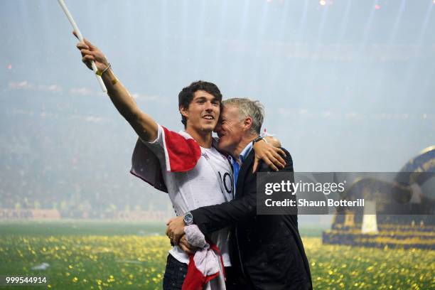 Didier Deschamps, Manager of France celebrates victory with son Dylan following the 2018 FIFA World Cup Final between France and Croatia at Luzhniki...