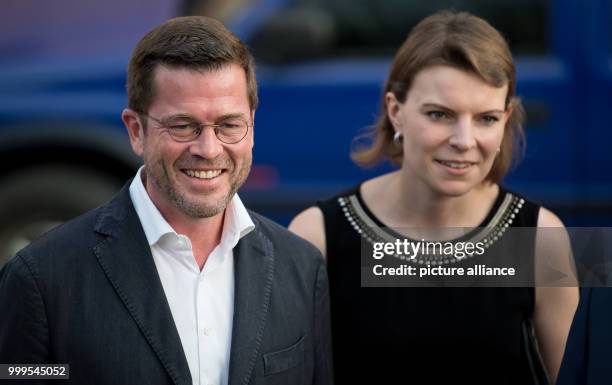 Former German Defence Minister Karl-Theodor zu Guttenberg and Emmi Zeulner arriving to a CSU electoral campaign event in the Stadthalle in Kulmbach,...