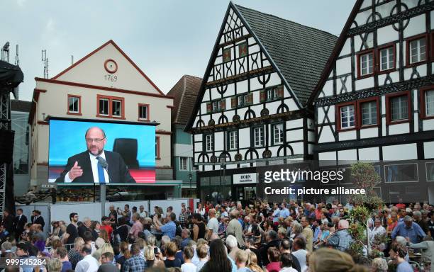 The SPD's candidate for Chancellor, Martin Schulz, giving a speech which can be seen on a video screen during an electoral campaign event in the...