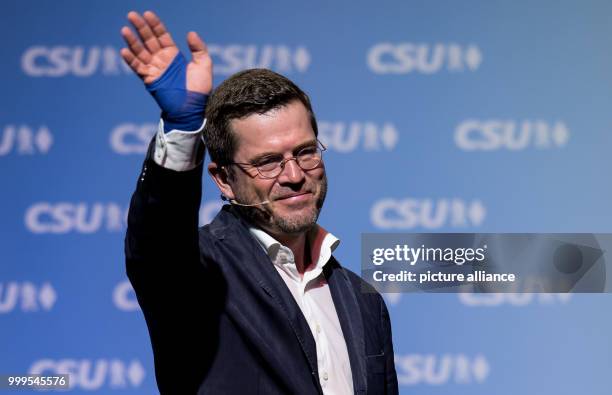 Former German Defence Minister Karl-Theodor zu Guttenberg giving thanks after a speech at a CSU electoral campaign event in the Stadthalle in...