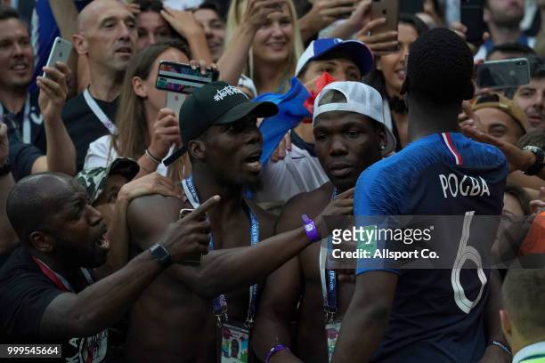 Paul Pogba of France celebrates victory over Croatia with his brothers and friends on the stands after the final during the 2018 FIFA World Cup...