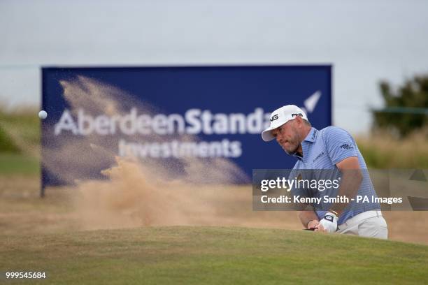 Lee Westwood plays from the bunker at the 15th hole during day four of the Aberdeen Standard Investments Scottish Open at Gullane Golf Club, East...