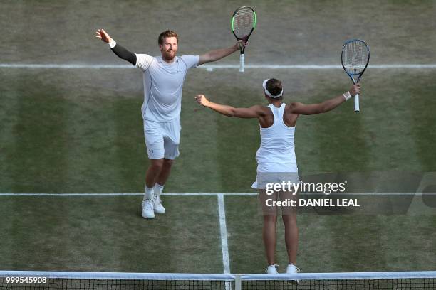 Austria's Alexander Peya and US player Nicole Melichar celebrate after beating Britain's Jamie Murray and Belarus's Victoria Azarenka 7-6, 6-3 in...