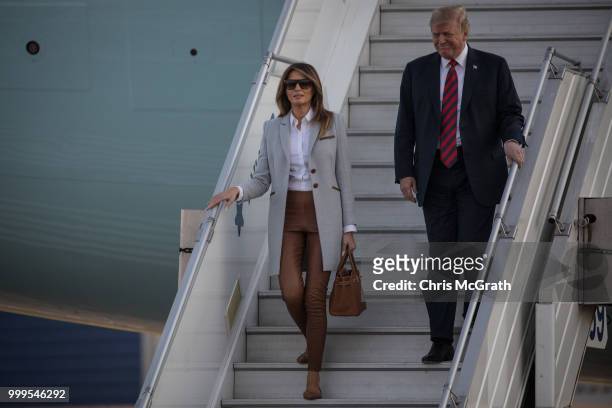 President Donald Trump and first lady, Melania Trump arrive aboard Air Force One at Helsinki International Airport on July 15, 2018 in Helsinki,...
