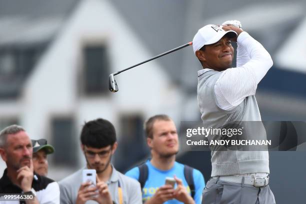 Golfer Tiger Woods tees off from the second during the first practice session at The 147th Open Championship at Carnoustie, Scotland on July 15, 2018.