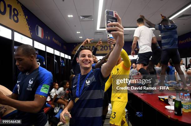 Florian Thauvin of France celebrates in the dressing room following his sides victory in the 2018 FIFA World Cup Final between France and Croatia at...