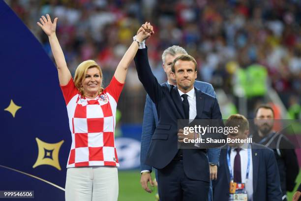 French President Emmanuel Macron and President of Croatia, Kolinda Grabar Kitarovic on the podium prior to the winners ceremony following the 2018...