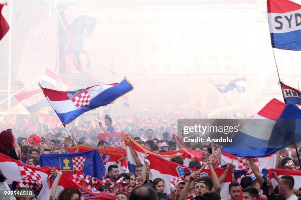 Croatian fans celebrate after winning the second place the 2018 FIFA World Cup Russia final match between France and Croatia at the Ban Jelacic...