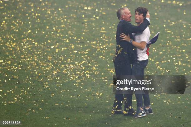 Didier Deschamps, Manager of France celebrates victory with son Dylan following the 2018 FIFA World Cup Final between France and Croatia at Luzhniki...