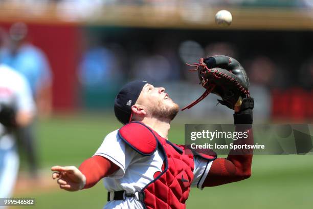 Cleveland Indians catcher Roberto Perez catches a foul ball off the bat of Cleveland Indians third baseman Jose Ramirez during the first inning of...