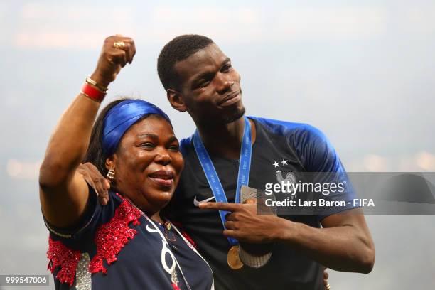 Paul Pogba of France celebrates victory with his mother Yeo following the 2018 FIFA World Cup Final between France and Croatia at Luzhniki Stadium on...