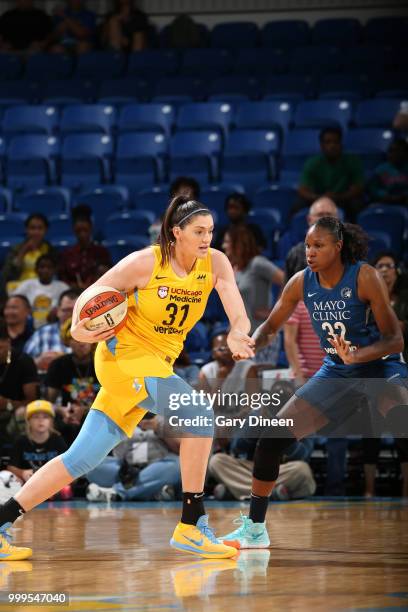 Stefanie Dolson of the Chicago Sky drives against Rebekkah Brunson of the Minnesota Lynx on July 07, 2018 at the Wintrust Arena in Chicago, Illinois....