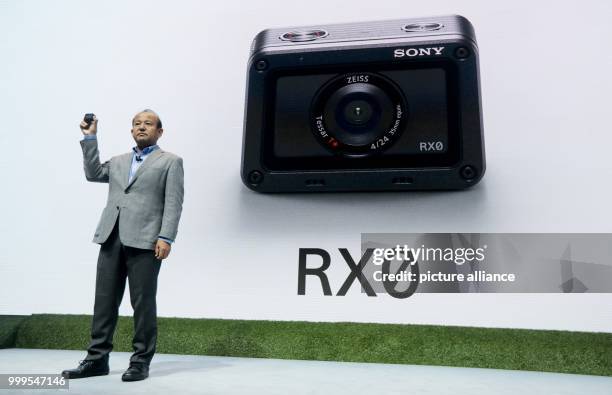 The President of Sony Europa, Shigeru Kumekawa, presents the new compatct camera RX0 at the stand of Sony during the 2nd press day of the industrial...