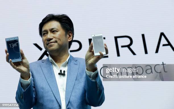 Hideyuki Furumi, EVP, Global Sales & Marketing and director of Sony Mobile Communications, presents the new Sony smartphone Xperia XZ1 during the 2nd...