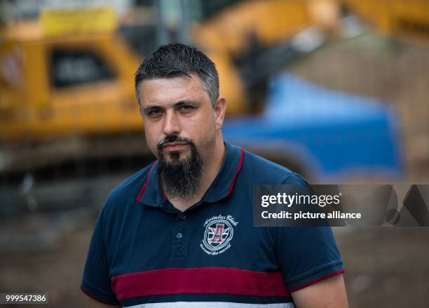 Demolition expert Rene Bennert of the bomb removal service stands at the location where the bomb was found in Frankfurt/Main, Germany, 31 August...