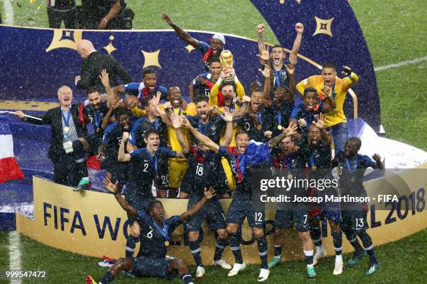 Hugo Lloris of France lifts the World Cup trophy to celebrate with his teammates after the 2018 FIFA World Cup Final between France and Croatia at...