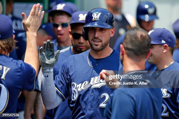 Travis Shaw of the Milwaukee Brewers celebrates after hitting a home run in the second inning against the Pittsburgh Pirates at PNC Park on July 15,...