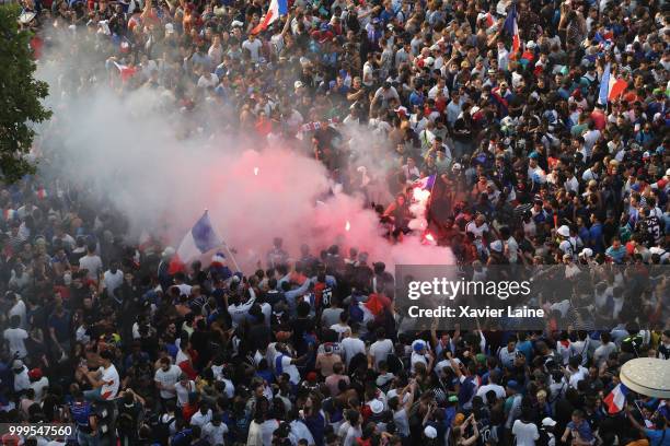 Fans Celebrate France Winning The World Cup 2018 Final Against Croatia at Champs Elysee, on July 15, 2018 in Paris, France.