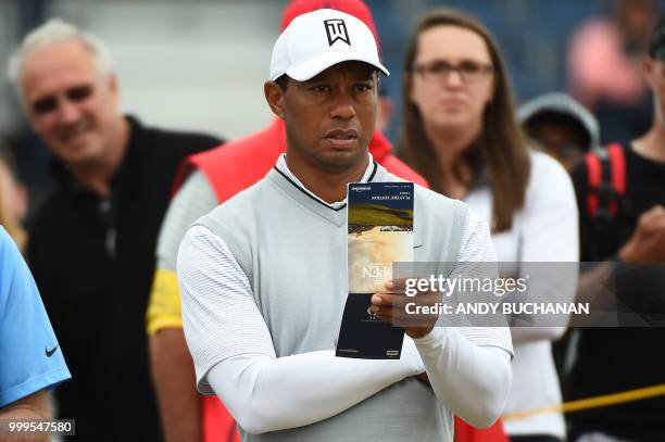 Golfer Tiger Woods gestures on the 4th tee during the first practice session at The 147th Open Championship at Carnoustie, Scotland on July 15, 2018.