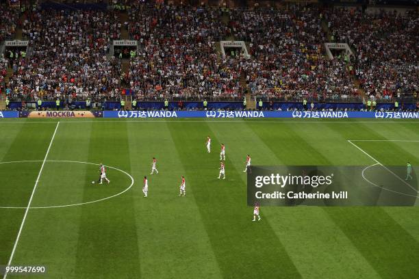 Croatia players walk dejected back to half way line to kick off after conceding a goal during the 2018 FIFA World Cup Final between France and...